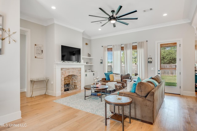 101 Coventry Ln, Canton, MS 39046 - living area featuring a ceiling fan, visible vents, a wealth of natural light, and light wood-style flooring