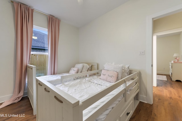 bedroom featuring dark hardwood / wood-style floors