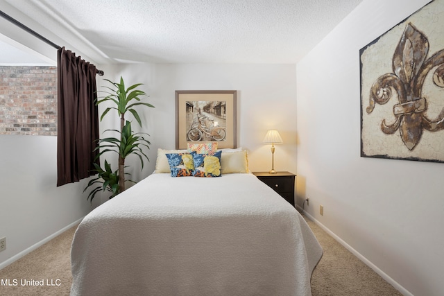 carpeted bedroom with a textured ceiling