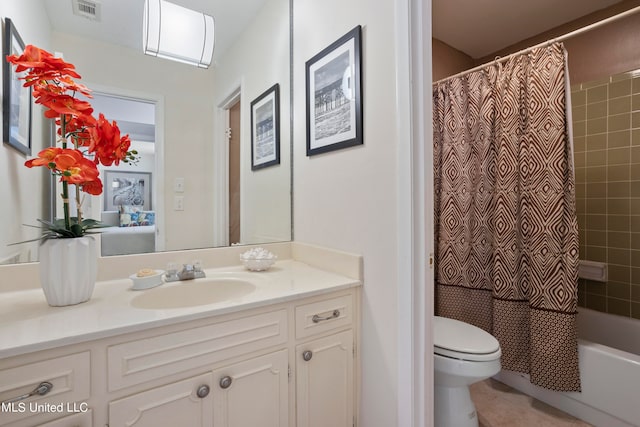 full bathroom with tile patterned flooring, vanity, toilet, and shower / tub combo with curtain