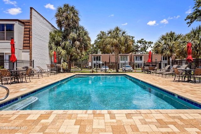 view of pool featuring a patio area