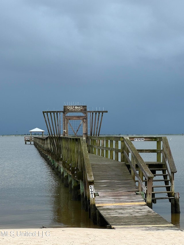 view of dock featuring a water view