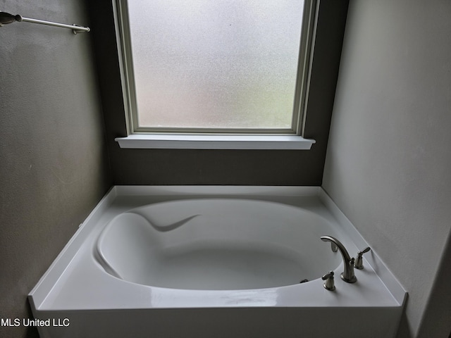 45 Carlsbad, Hattiesburg, MS 39402 - bathroom featuring plenty of natural light and a bath