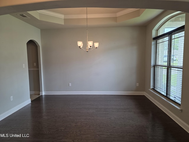45 Carlsbad, Hattiesburg, MS 39402 - spare room with crown molding, dark wood-style flooring, a raised ceiling, a healthy amount of sunlight, and visible vents