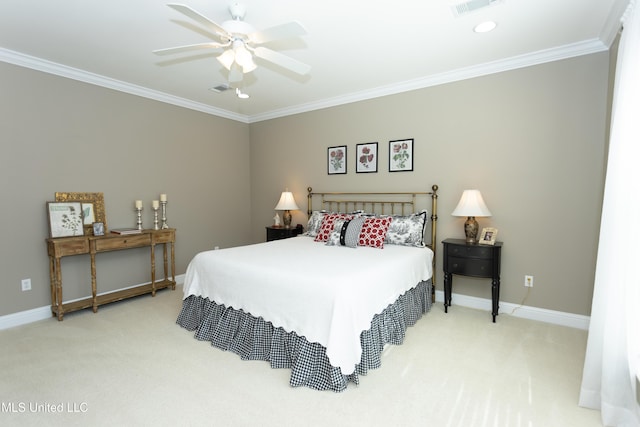 bedroom featuring ceiling fan, ornamental molding, and carpet flooring