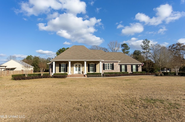 view of front facade featuring a front yard and a porch