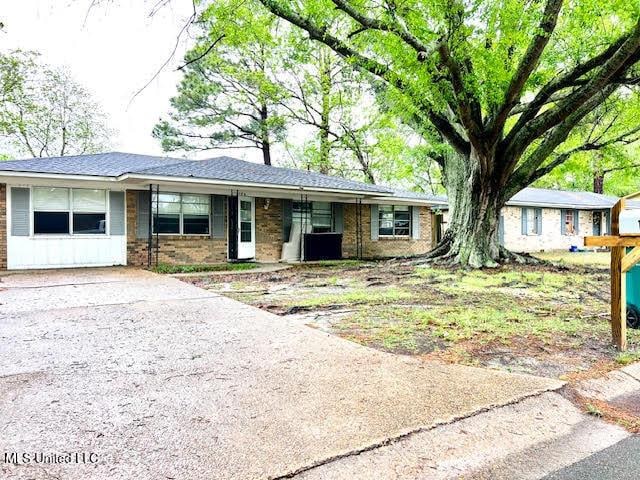 126 Ben Dr, Gulfport, MS 39503 - ranch-style home with brick siding and driveway