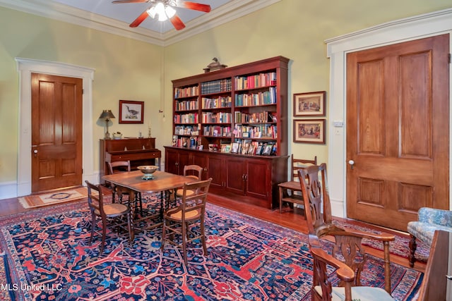 sitting room with ceiling fan, hardwood / wood-style floors, and ornamental molding