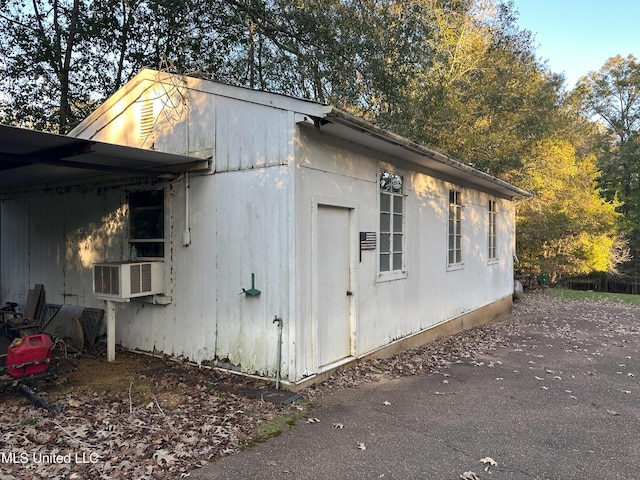 view of outdoor structure featuring cooling unit