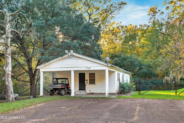 view of front of house featuring a carport