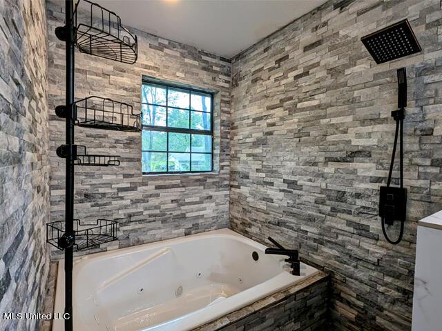 bathroom featuring plus walk in shower