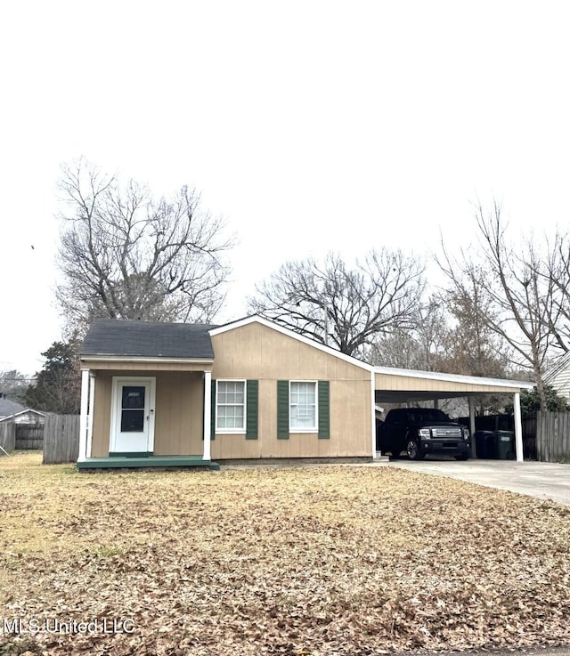 view of home's exterior featuring a carport