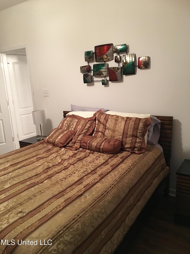 bedroom featuring hardwood / wood-style floors