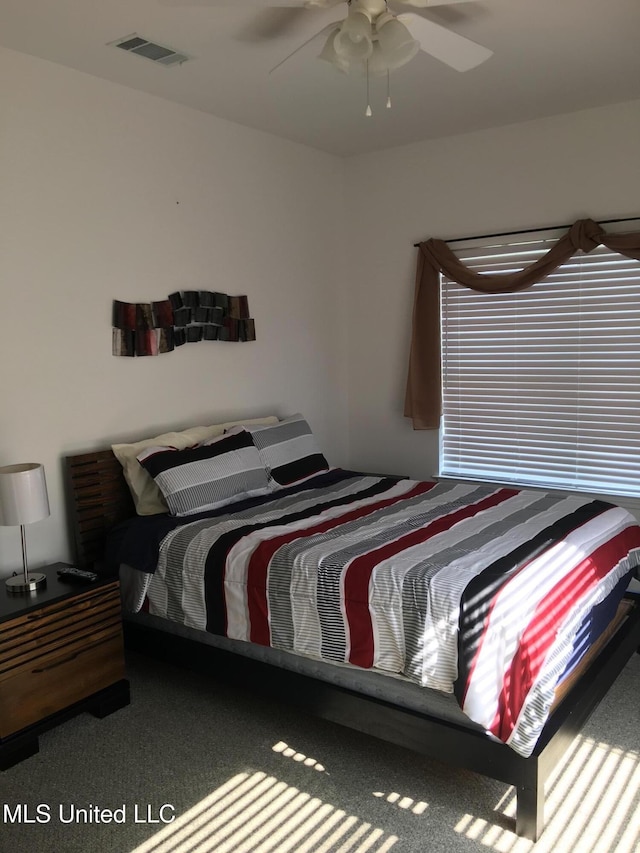 bedroom with carpet and ceiling fan