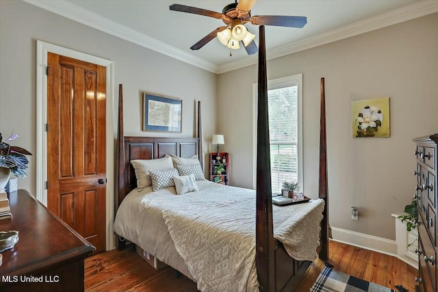 bedroom featuring ceiling fan, ornamental molding, and dark hardwood / wood-style floors