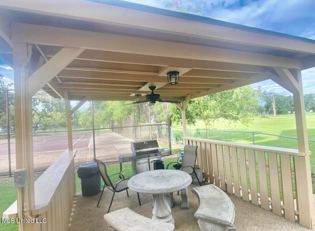 view of patio featuring grilling area and ceiling fan