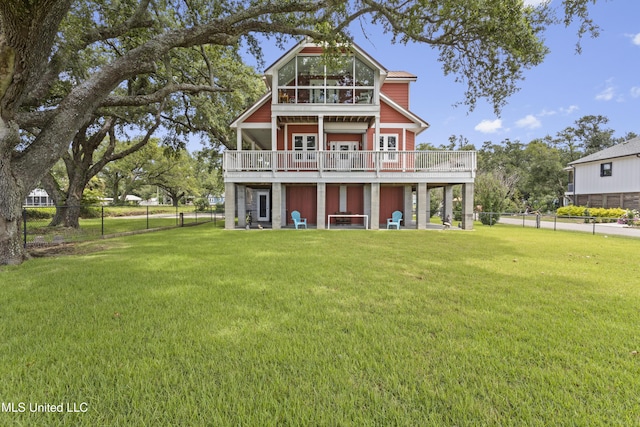 5200 W Beach Blvd, Gulfport, MS 39501 - back of property with a fenced backyard and a wooden deck