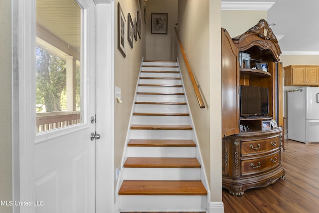5200 W Beach Blvd, Gulfport, MS 39501 - stairway featuring crown molding and wood finished floors