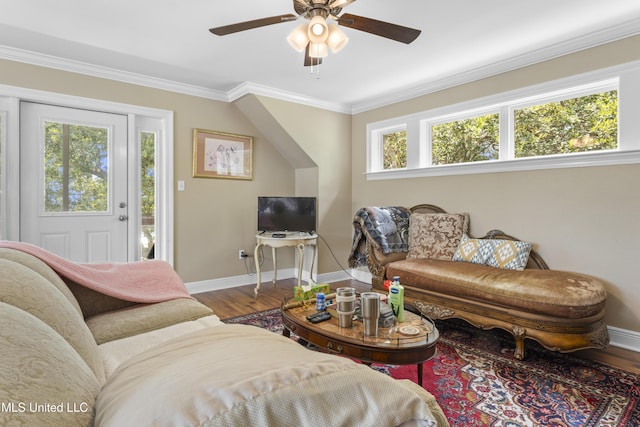 5200 W Beach Blvd, Gulfport, MS 39501 - living area featuring wood finished floors, a ceiling fan, and crown molding