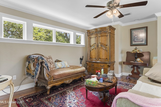 5200 W Beach Blvd, Gulfport, MS 39501 - living area with ceiling fan, wood finished floors, and ornamental molding