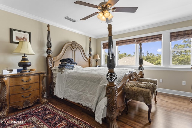 5200 W Beach Blvd, Gulfport, MS 39501 - bedroom featuring wood finished floors, ornamental molding, and ceiling fan