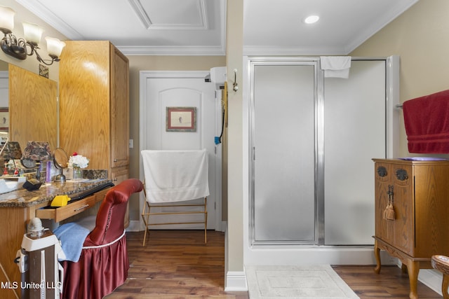 5200 W Beach Blvd, Gulfport, MS 39501 - bathroom with a shower stall, wood finished floors, recessed lighting, and crown molding