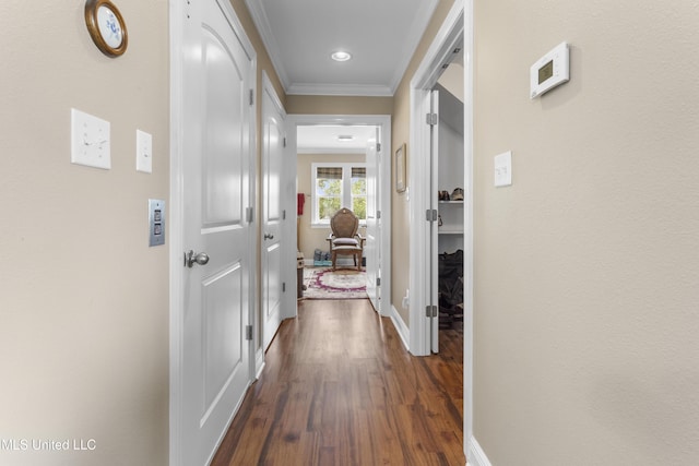 5200 W Beach Blvd, Gulfport, MS 39501 - hallway with dark wood-type flooring and crown molding