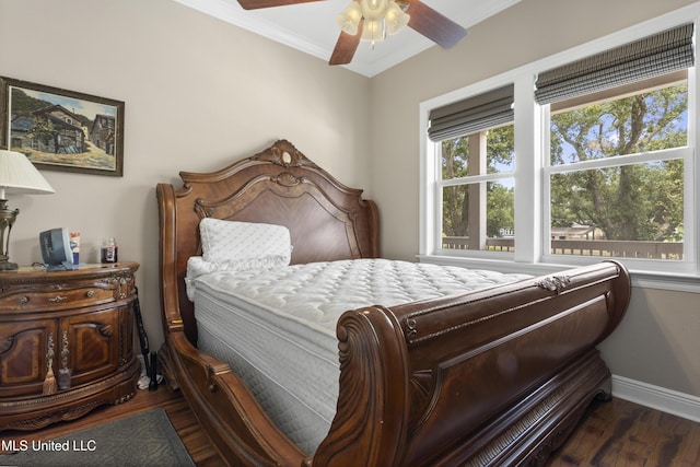 5200 W Beach Blvd, Gulfport, MS 39501 - bedroom with wood finished floors, ornamental molding, and a ceiling fan