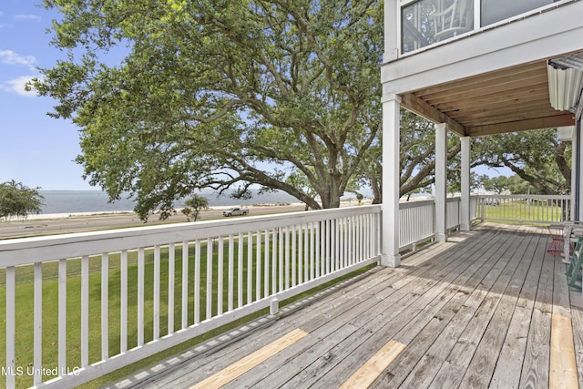 5200 W Beach Blvd, Gulfport, MS 39501 - deck featuring a yard and a water view