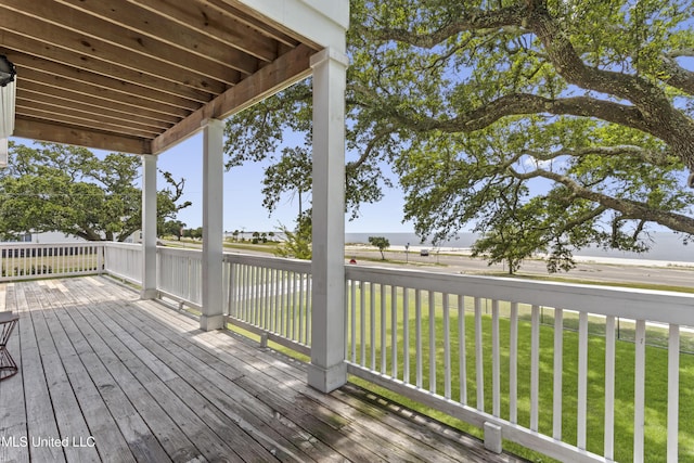 5200 W Beach Blvd, Gulfport, MS 39501 - deck with a lawn and a water view