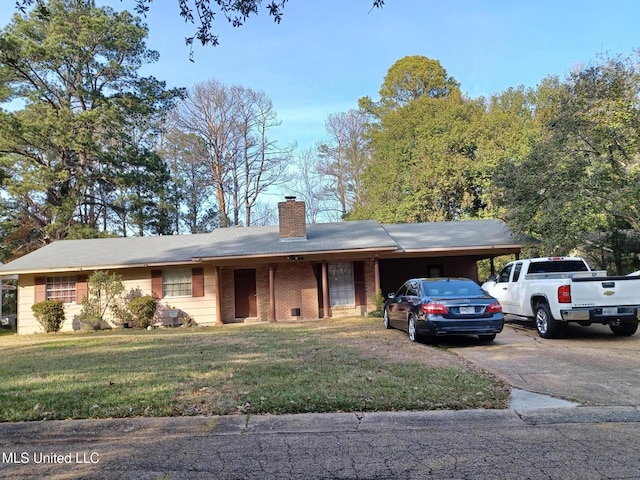 single story home featuring a carport and a front yard