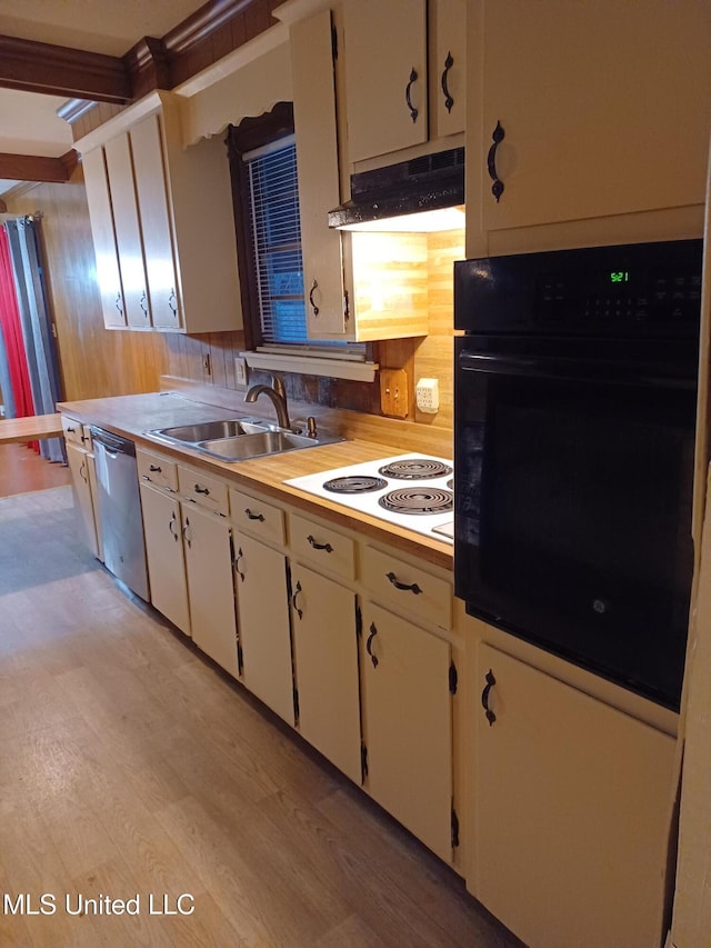 kitchen featuring white electric cooktop, light wood-type flooring, oven, stainless steel dishwasher, and sink