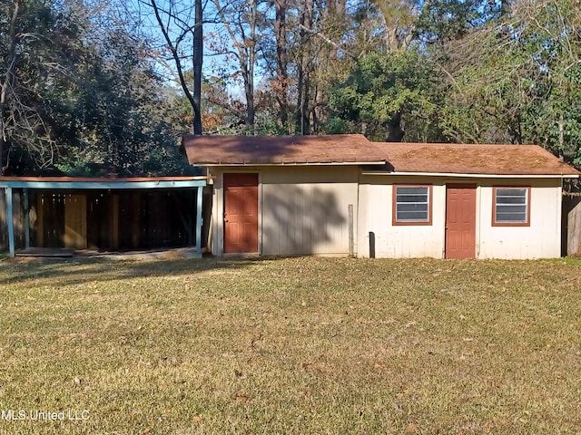 view of outdoor structure with a yard