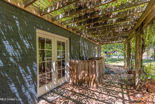 view of patio featuring french doors