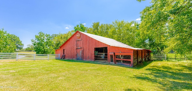 view of outdoor structure featuring a rural view