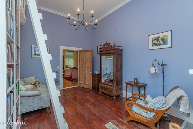 3775 Coker Rd, Madison, MS 39110 - living area with dark wood-style flooring, a chandelier, ornamental molding, a high ceiling, and baseboards