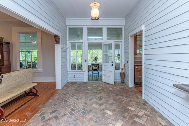 sunroom featuring plenty of natural light