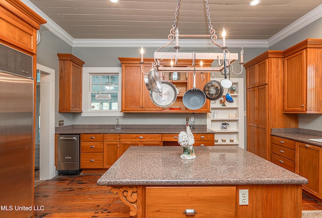 kitchen with stainless steel built in fridge, a kitchen island, crown molding, and dark hardwood / wood-style floors