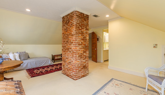 carpeted bedroom with lofted ceiling, ornamental molding, and decorative columns