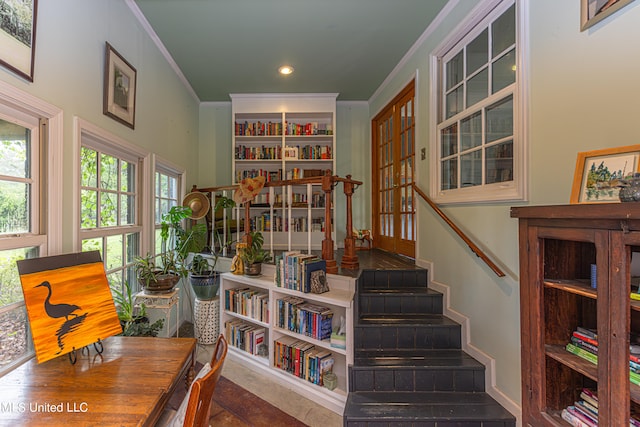 sitting room featuring ornamental molding