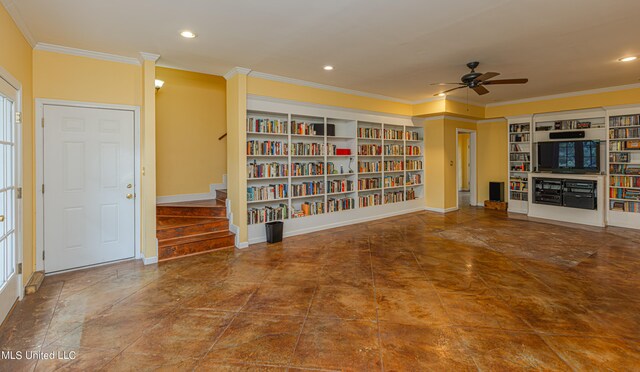 unfurnished room featuring crown molding, built in features, and ceiling fan