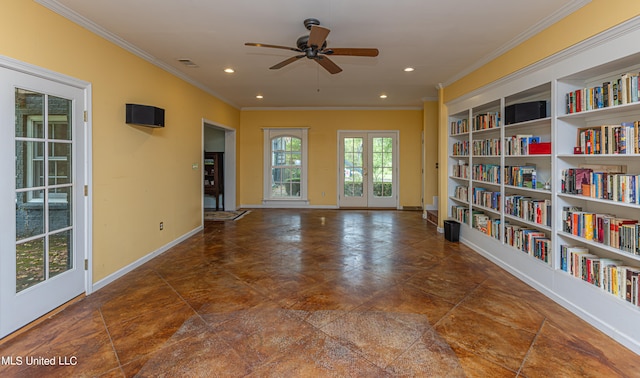 empty room featuring ornamental molding, french doors, built in shelves, and ceiling fan