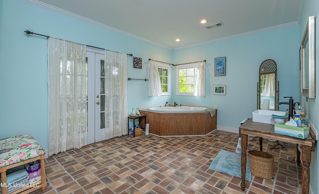3775 Coker Rd, Madison, MS 39110 - full bathroom featuring french doors, a garden tub, brick flooring, recessed lighting, and ornamental molding