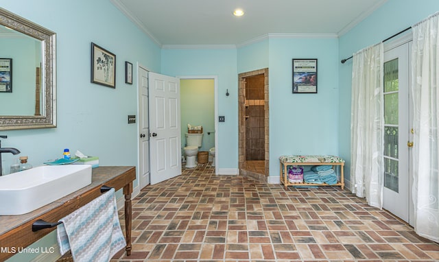 3775 Coker Rd, Madison, MS 39110 - full bath with brick patterned flooring, toilet, baseboards, vanity, and crown molding
