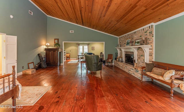 living room with high vaulted ceiling, wood ceiling, a brick fireplace, hardwood / wood-style flooring, and ornamental molding