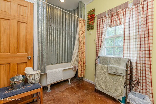 living area with dark tile patterned floors