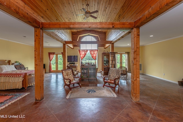 interior space featuring wood ceiling, french doors, dark tile patterned floors, and ceiling fan