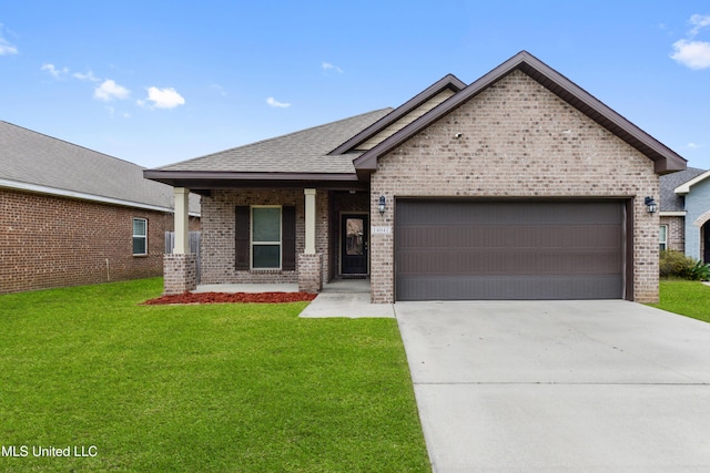 craftsman inspired home with a porch, a garage, and a front lawn