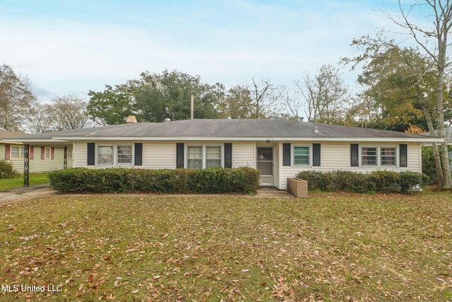 ranch-style house featuring a front lawn