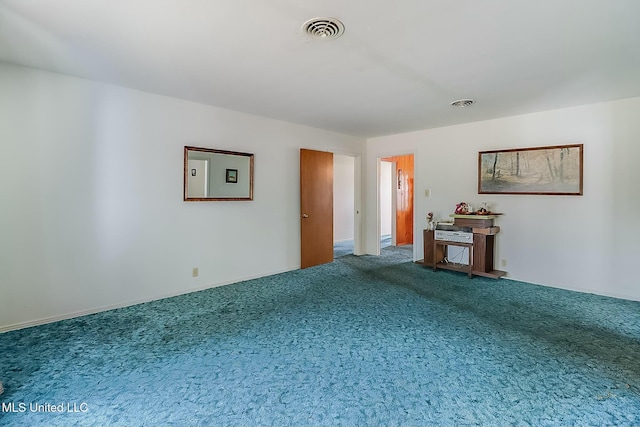 unfurnished living room with carpet